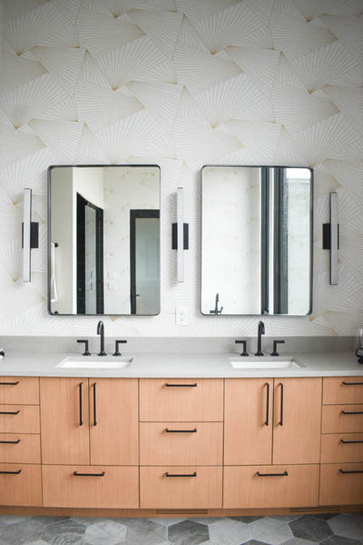 Interior design of mid-century modern styled bathroom with double vanity. Designed by interior designer Erica LeMaster Sargent. 