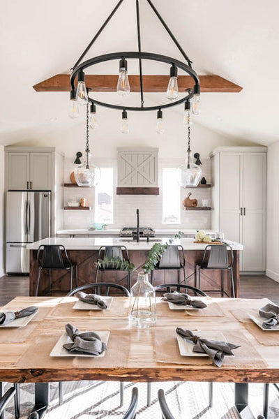 Interior design of transitional ranch styled kitchen dining area with natural wood table. Designed by interior designer Erica LeMaster Sargent. 