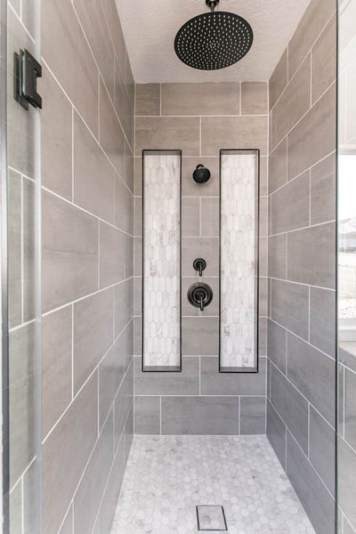 Interior design of large master bath shower. Designed by interior designer Erica LeMaster Sargent. 