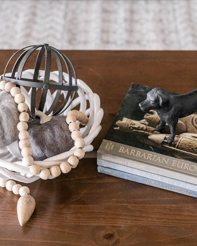 Interior design of coffee table and decor. Designed by interior designer Erica LeMaster Sargent. 