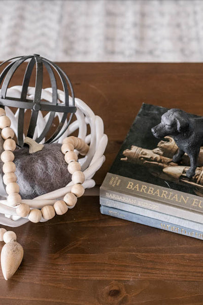 Interior design of coffee table and decor. Designed by interior designer Erica LeMaster Sargent. 