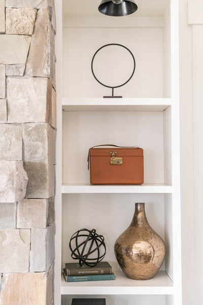 Interior design of decorated shelves in transitional farmhouse. Designed by interior designer Erica LeMaster Sargent. 